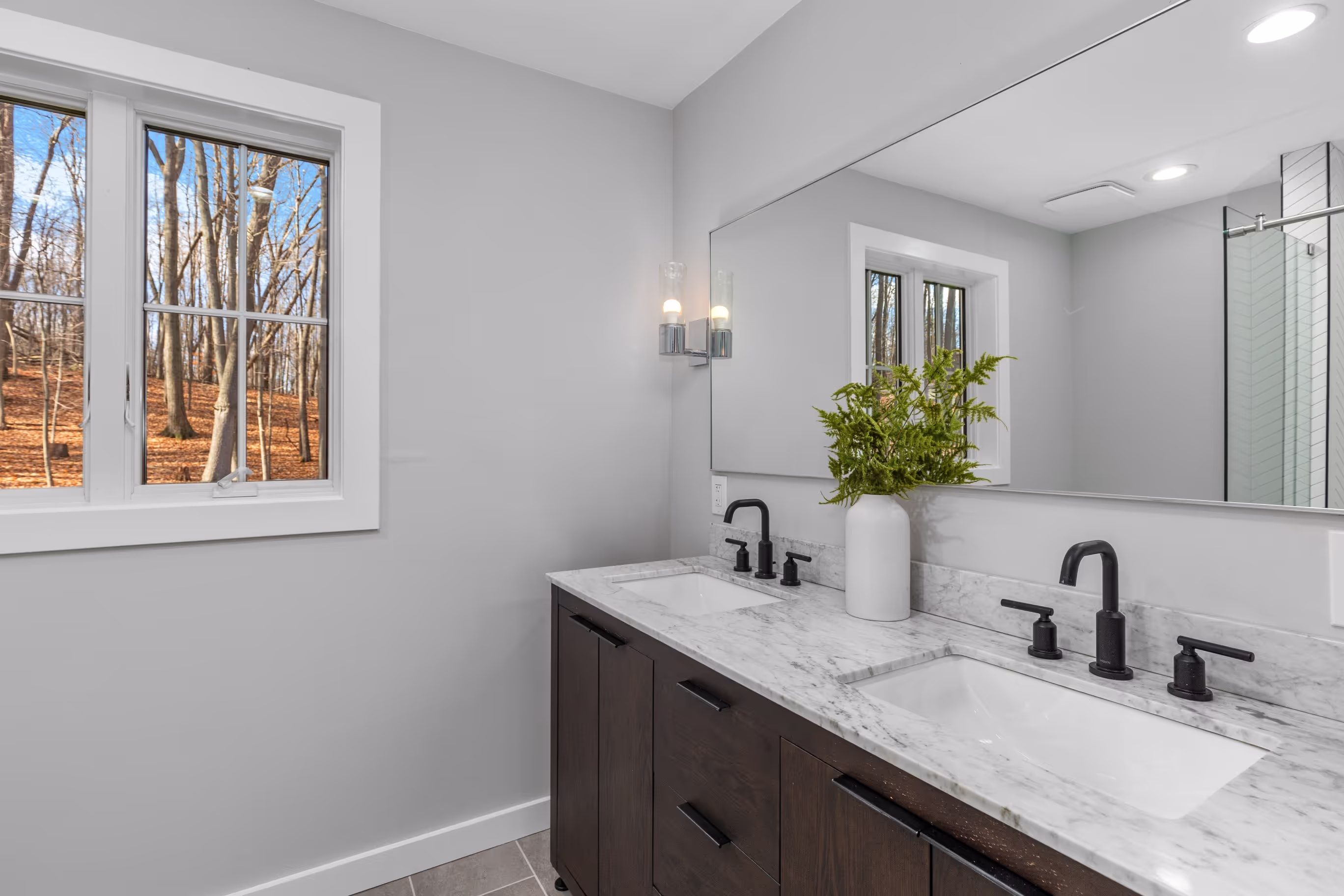 Bathroom remodel with a newly positioned window