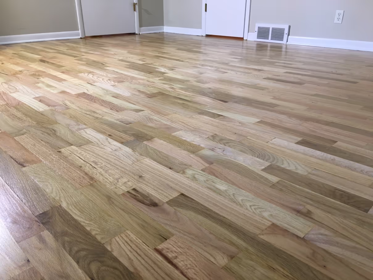 Hardwood restoration and new flooring, from LVP and tile to carpet, installed to meet the needs and character of your home.