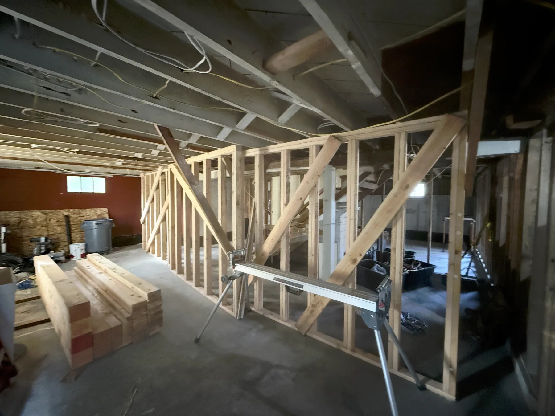 Wide view of temporary support walls across the basement