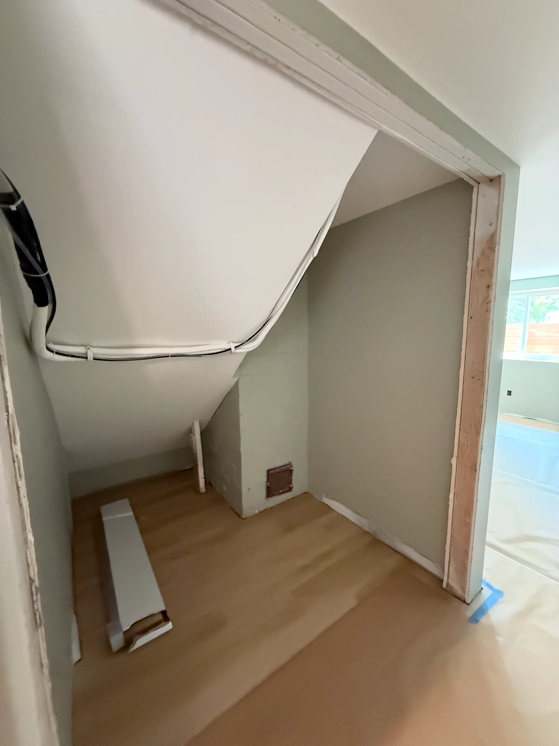 Painted under-stair area during finish work