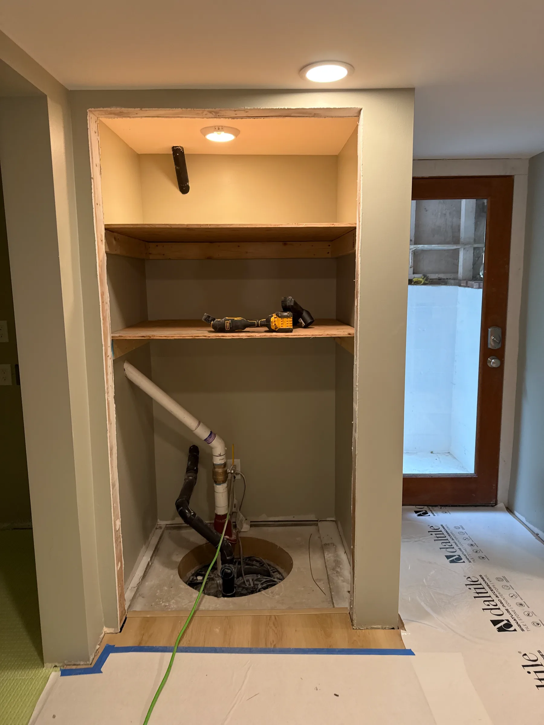 Painted utility area during final detail work