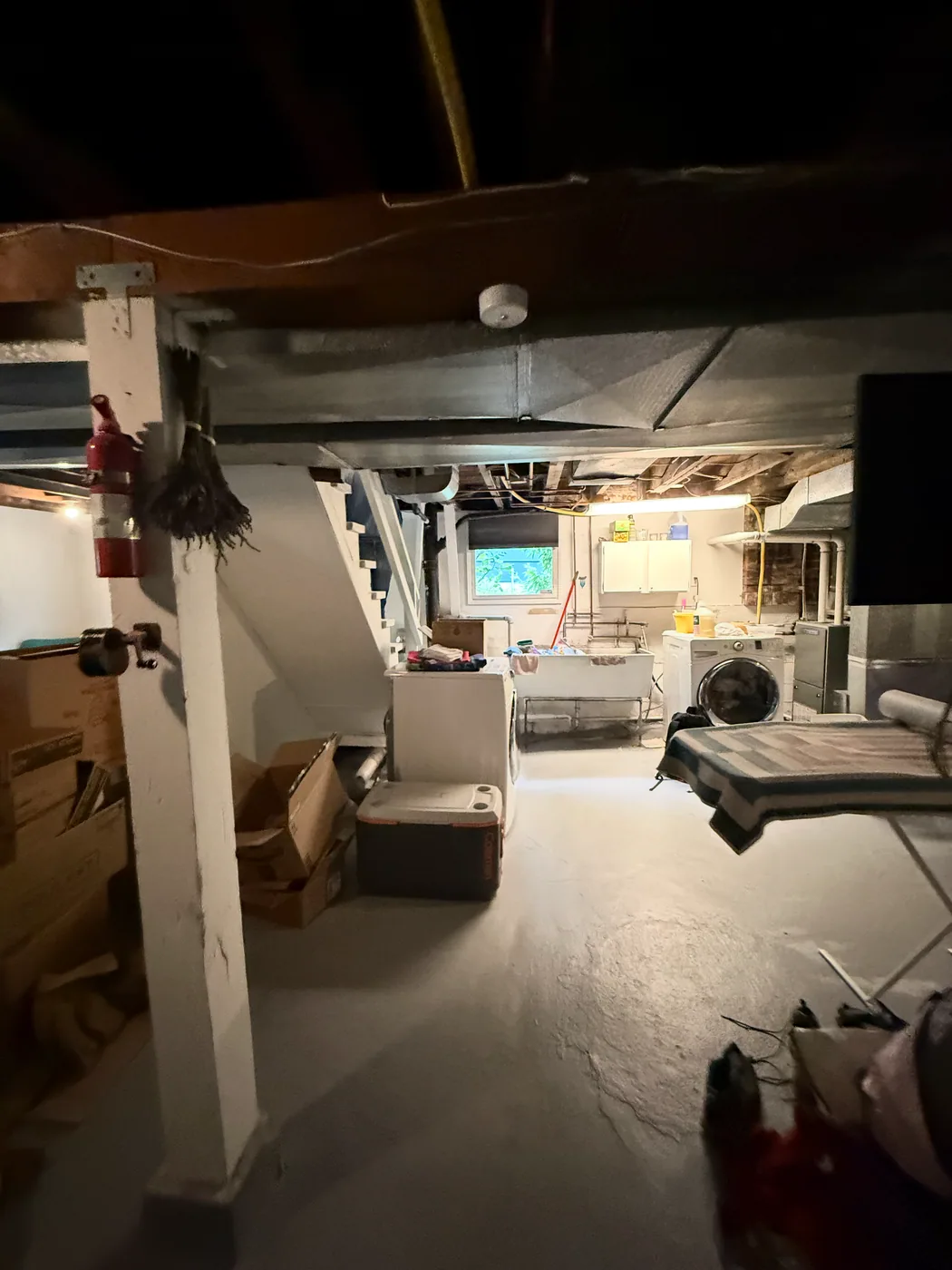Wide view of the Ravenna basement before floor demolition