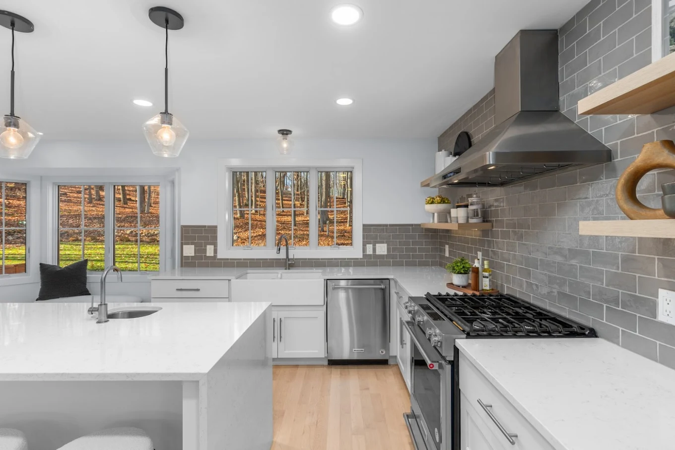 Kitchen island, range and wooded views