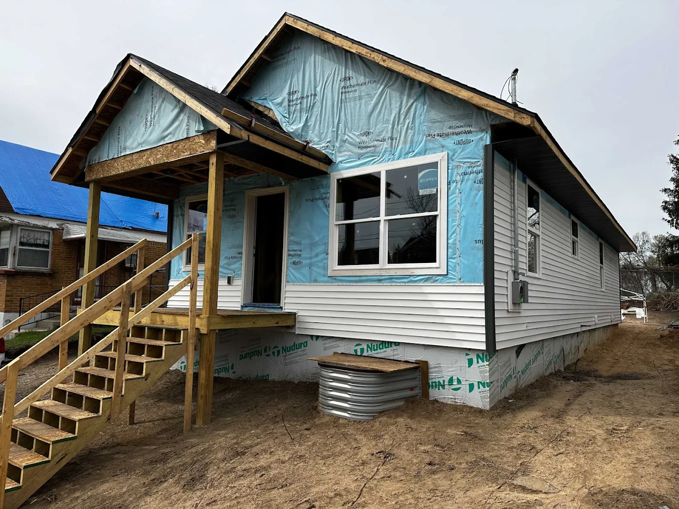 DADU exterior during siding and porch construction