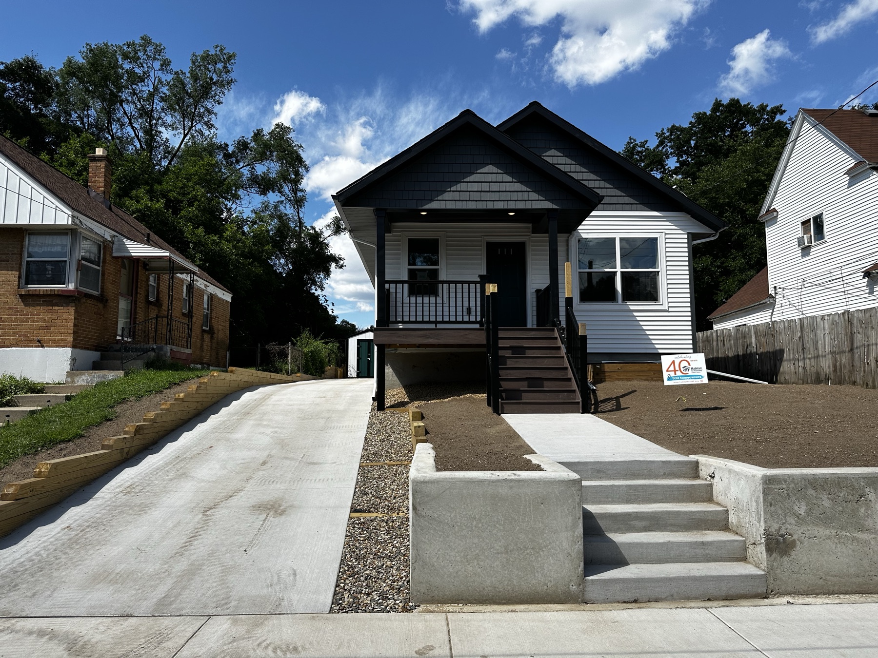 Completed accessible entry and front elevation of the Habitat home